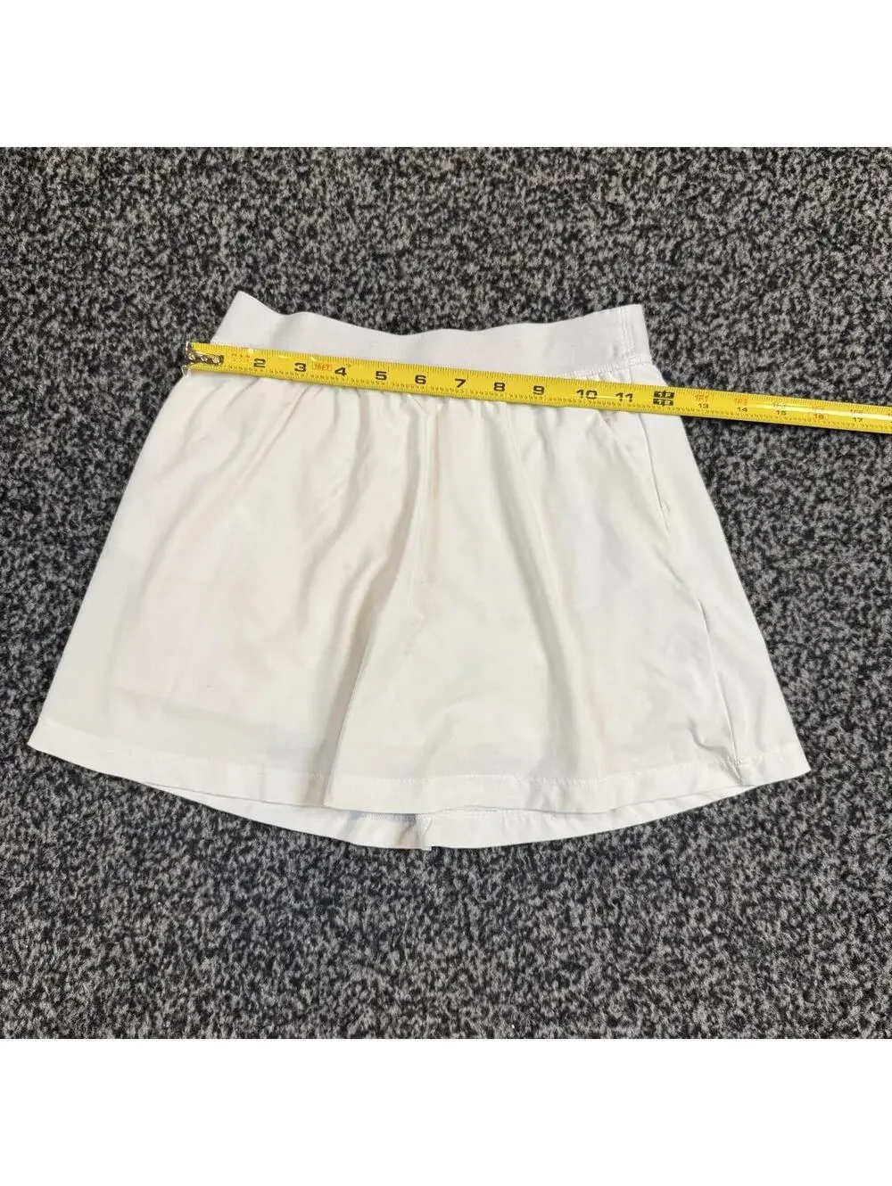 DSG Golf white tennis skirt in size M